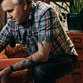 Fit model wearing shirt and kneeling