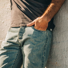 our fit model wearing The Democratic Jean in 24-Month Wash Japanese Selvage—left hand in pocket, close up shot