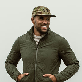 our fit model wearing The Ball Cap in Arid Camo