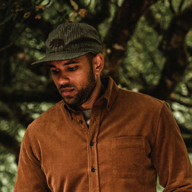 our fit model wearing The Ball Cap in Rain Drop