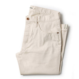 folded flatlay of The Democratic Jean in Natural Organic Selvage