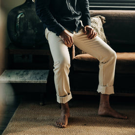 fit model at home barefoot in The Democratic Jean in Natural Organic Selvage