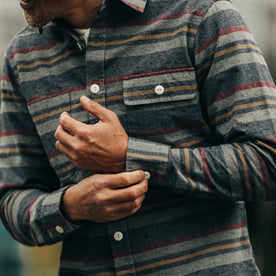 fit model rocking The Moto Shirt in Blanket Stripe, fixing sleeve
