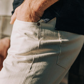 fit model with hand in pocket of The Slim Jean in Natural Organic Selvage