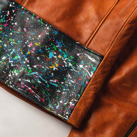 closeup of The Moto Jacket in Whiskey & Cosmos