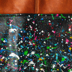 material shot of the cosmos paint detailing on The Moto Jacket in Whiskey & Cosmos