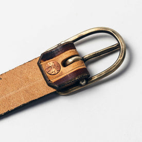 studio shot of The Stitched Belt in Cortado—buckle detail
