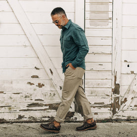 our fit model wearing The Camp Pant in Ash Boss Duck—walking left