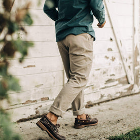 our fit model wearing The Camp Pant in Ash Boss Duck—walking right