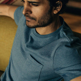 our fit model wearing The Heavy Bag Tee in Slate—cropped shot looking down