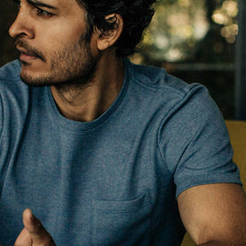 our fit model wearing The Heavy Bag Tee in Slate—cropped shot looking left