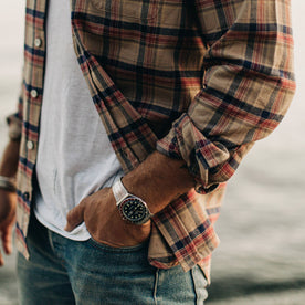 our fit model wearing The Jack in Brushed Khaki Plaid—cropped shot of cuffed sleeve