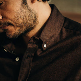 our fit model relaxing in The Jack in Brushed Rust Oxford—cropped shot of collar