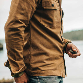 our fit model wearing The Shop Shirt in British Khaki Boss Duck—cropped shot of shirt side