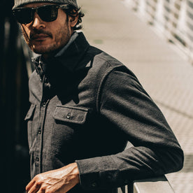 our fit model wearing The Yosemite Shirt in Black—cropped shot of left sleeve