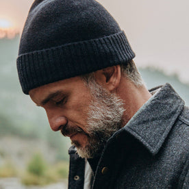 our fit model wearing The Beanie in Navy Baby Yak—looking down