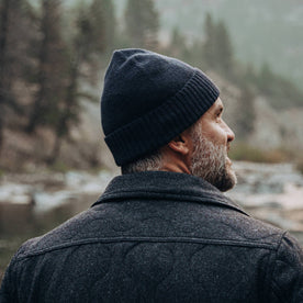 our fit model wearing The Beanie in Navy Baby Yak—looking right