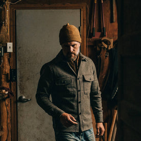 our fit model wearing The Beanie in Ochre Baby Yak—looking down