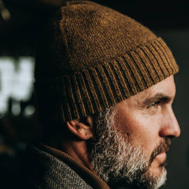 our fit model wearing The Beanie in Ochre Baby Yak—looking right if screen
