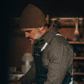 our fit model wearing The Beanie in Ochre Baby Yak—working, apron on