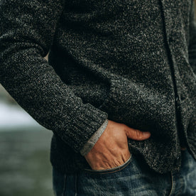 fit model wearing The Bomber Sweater in Black Sesame, hand in pocket