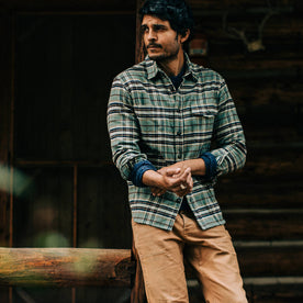 fit model wearing The Crater Shirt in Blue Plaid, looking ;eft