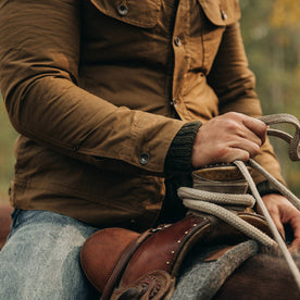 fit model wearing The Lined Long Haul Jacket in Harvest Tan Dry Wax, sleeve