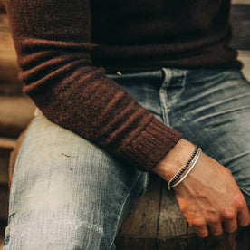 our fit model wearing The Lodge Sweater in Chocolate—cropped shot of wrist