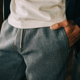 fit model wearing The Après Pant in Charcoal Waffle, close up shot of fabric