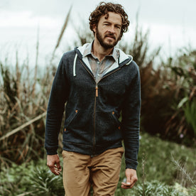 Our fit model wearing The Après Hoodie in Navy from Taylor Stitch.