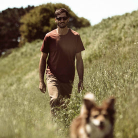 Our fit model wearing The Antoni Tee in Heather Brick by Taylor Stitch.