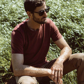 Our fit model wearing The Antoni Tee in Heather Brick by Taylor Stitch.