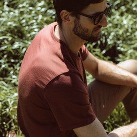 Our fit model wearing The Antoni Tee in Heather Brick by Taylor Stitch.