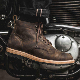 our fit model wearing The Moto Boot in Espresso Grizzly from Taylor Stitch.