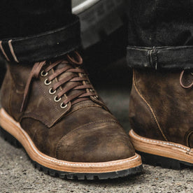 our fit model wearing The Moto Boot in Espresso Grizzly from Taylor Stitch.