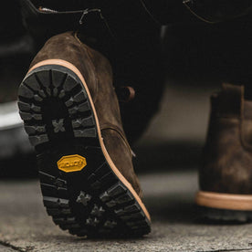our fit model wearing The Moto Boot in Espresso Grizzly from Taylor Stitch.