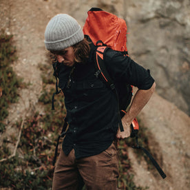Our fit model wearing the black Yosemite about to go rock climbing