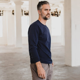 our fit model wearing The Heavy Bag Long Sleeve in Navy