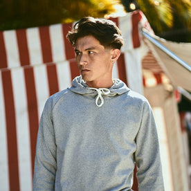 our fit model wearing The Heavy Bag Hoodie in Heather Grey