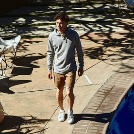our fit model wearing The Heavy Bag Hoodie in Heather Grey