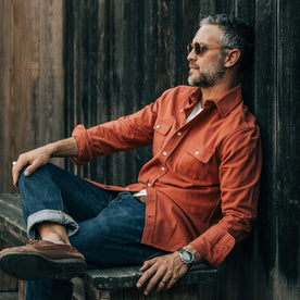 Our fit model wearing The Yosemite Shirt in Dusty Red by Taylor Stitch.