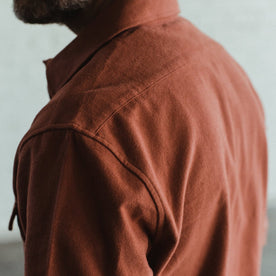 Our fit model wearing The Yosemite Shirt in Dusty Red by Taylor Stitch.