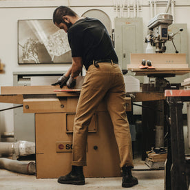 Our fit model wearing The Camp Pant in British Khaki Tuff Duck from Taylor Stitch.