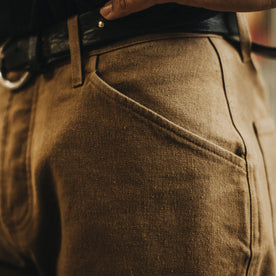 Our fit model wearing The Camp Pant in British Khaki Tuff Duck from Taylor Stitch.