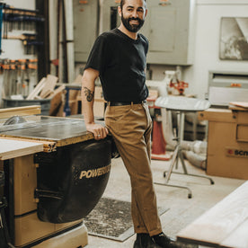 Our fit model wearing The Camp Pant in British Khaki Tuff Duck from Taylor Stitch.