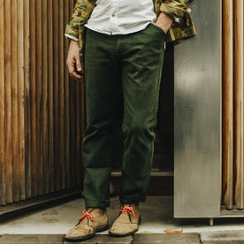 Our fit model wearing The Camp Pant in Dark Olive Tuff Duck from Taylor Stitch.