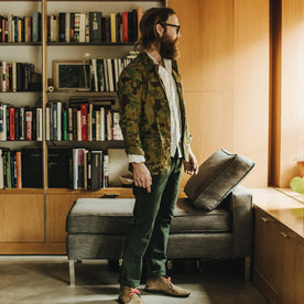 Our fit model wearing The Camp Pant in Dark Olive Tuff Duck from Taylor Stitch.