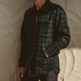 The fit model standing against a wall in Downtown SF