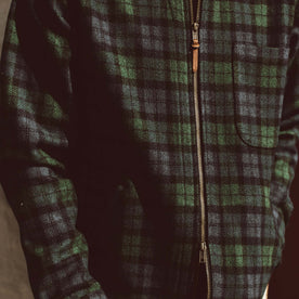 The fit model showing the zipper of the Coit jacket