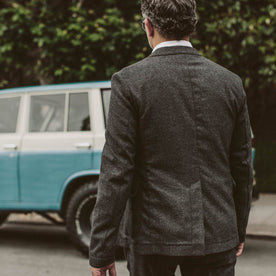 Our fit model wearing the Telegraph Suit and walking to his car
